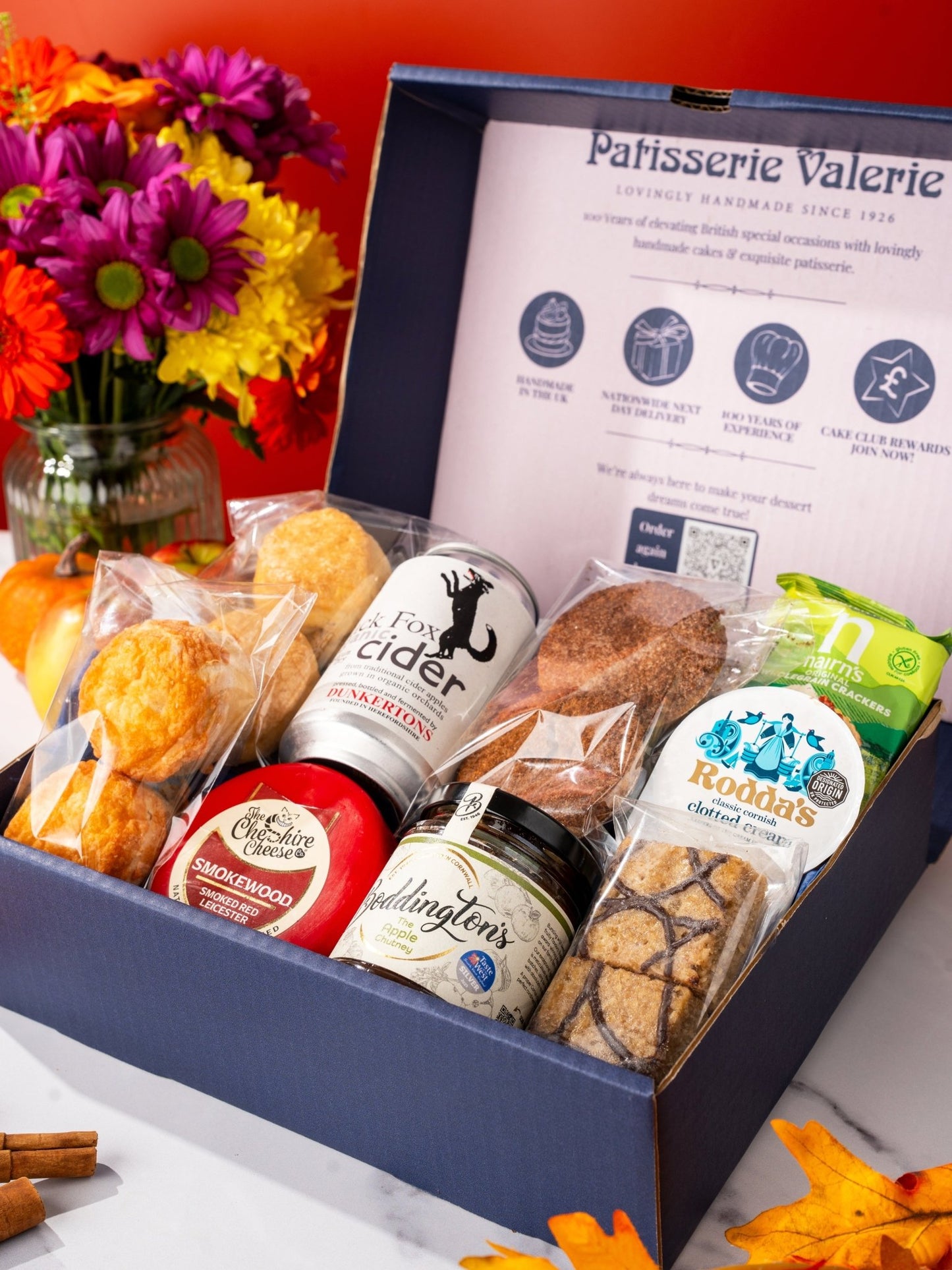 Patisserie Valerie's handmade Apple Orchard Gift Hamper with Craft Cider, Cheese & Chutney cake delivery