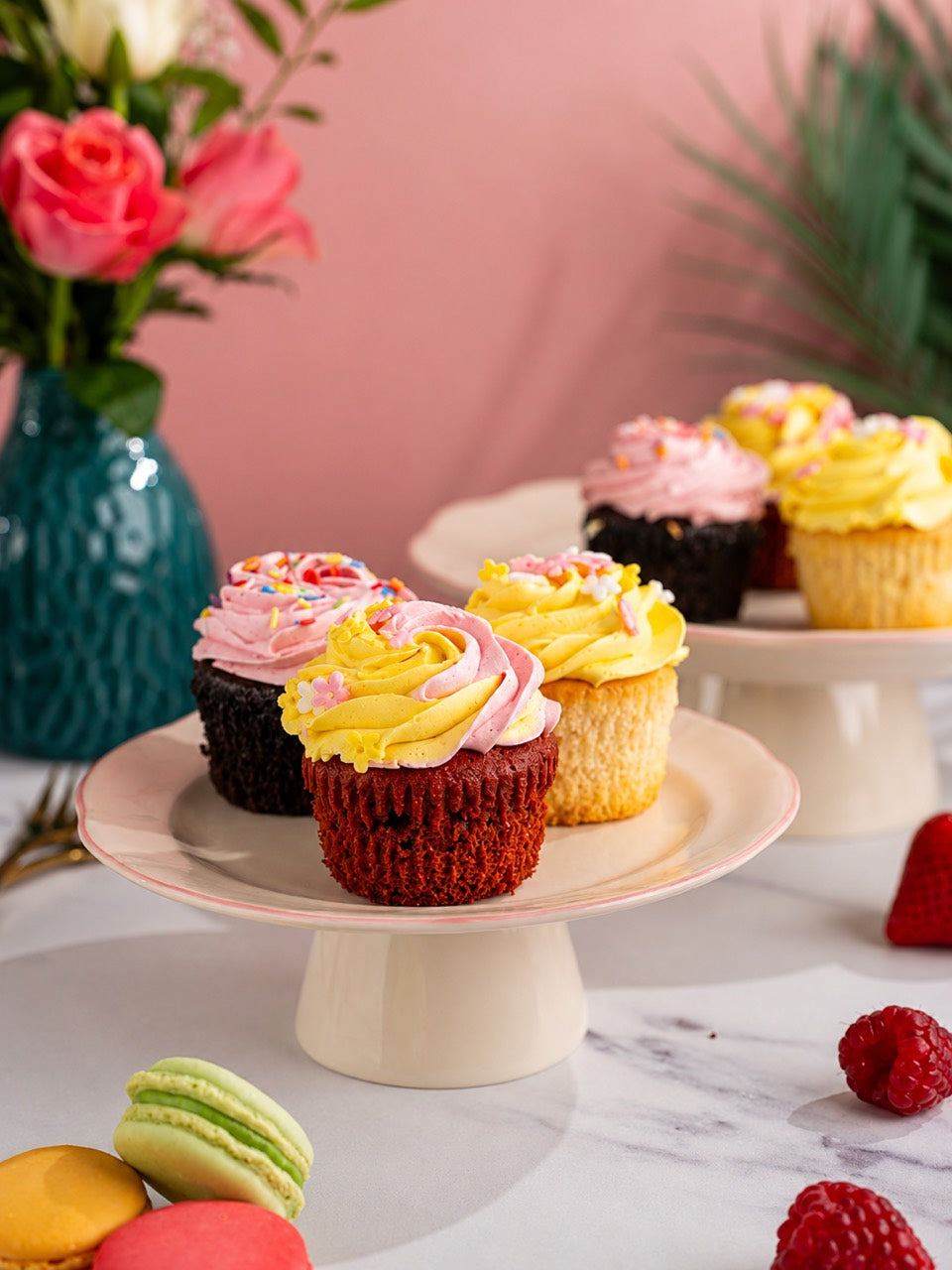 Blossom and Bloom cupcake selection in a spring lifestyle setting